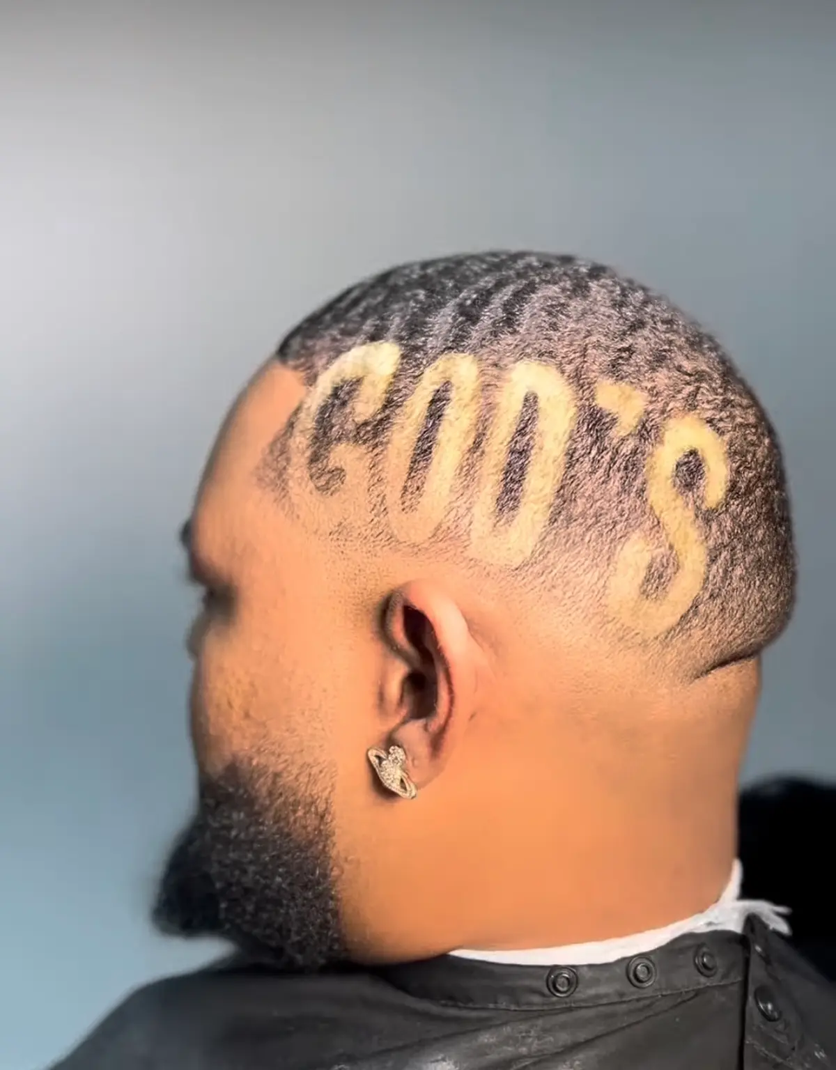 Custom hair design lettering 'God's' shaved and bleached by Miami Mobile Barber